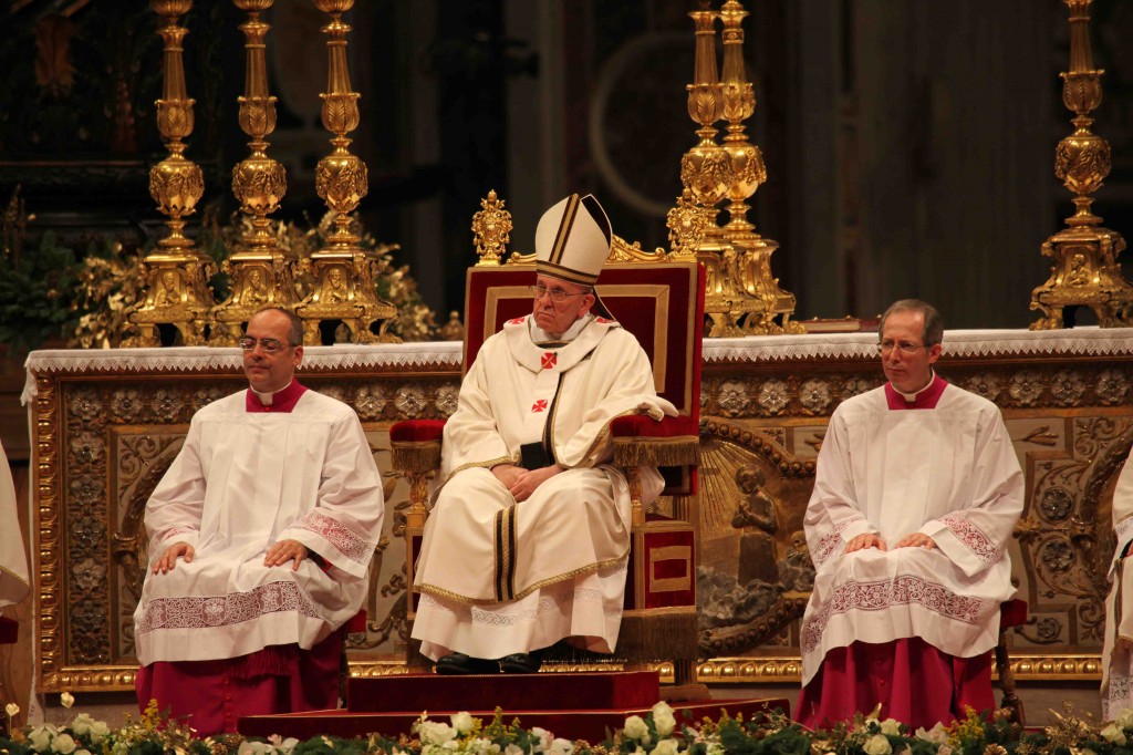 Pope Francis celebrates midnight mass. Photo: Mike Luongo