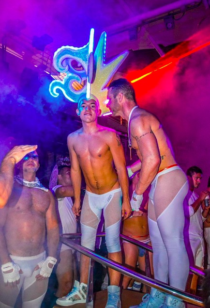 Atlantis cruise passengers enjoying the White Party as seen in ManABoutWorld gay travel magazine