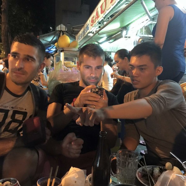 Gay Vietnam: Quan showing the NomadicBoys the yummy street food of Saigon