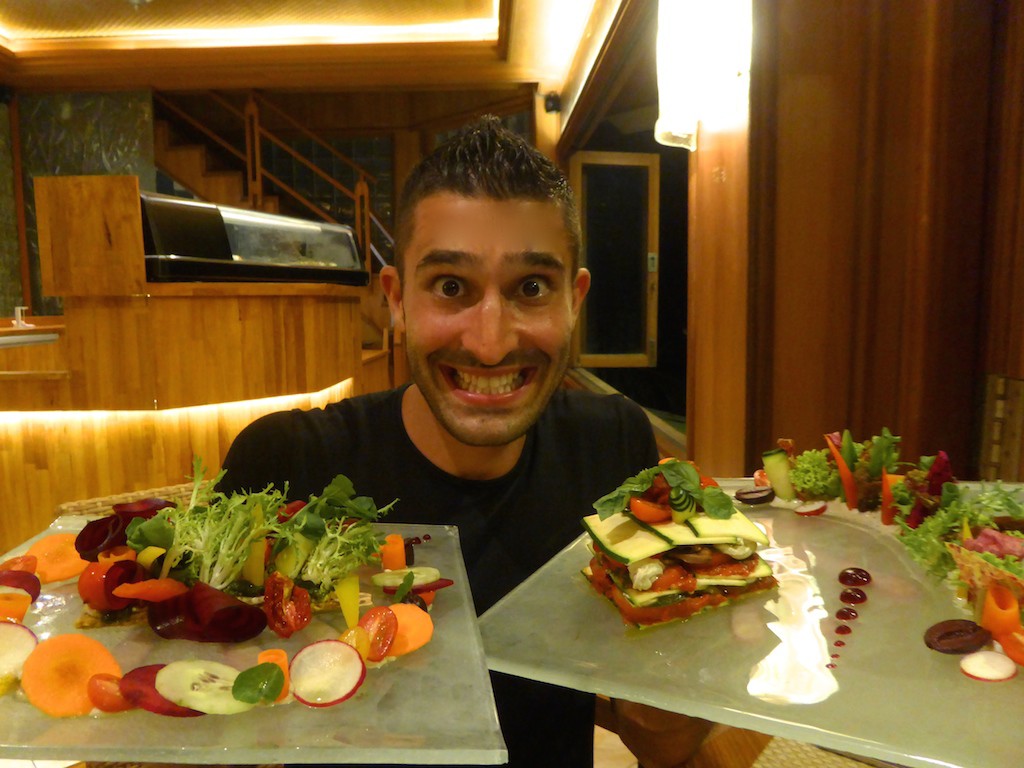 NomadicBoys in their first vegan restaurant in Ubud, Indonesia and in ManAboutWorld gay travel magazine